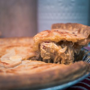 Fresh 9-inch spicy chicken pie baked golden brown