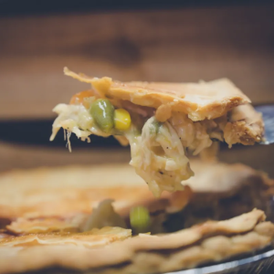 Freshly baked 9-inch chicken pot pie with golden crust